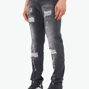 Flared jeans met rits en verf vlekken zwart