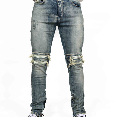 Ausgestellte Jeans mit Reißverschluss und Rippen am Knie. Blau